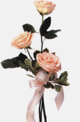 Blooming Osiana roses unified with soft, sheer ribbon whisper sweet affections.